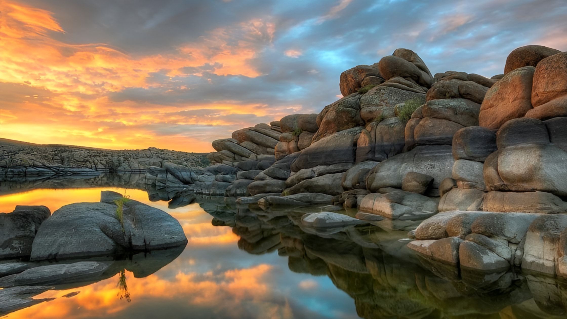 Sunset reflected in Watson Lake beside the Granite Dells